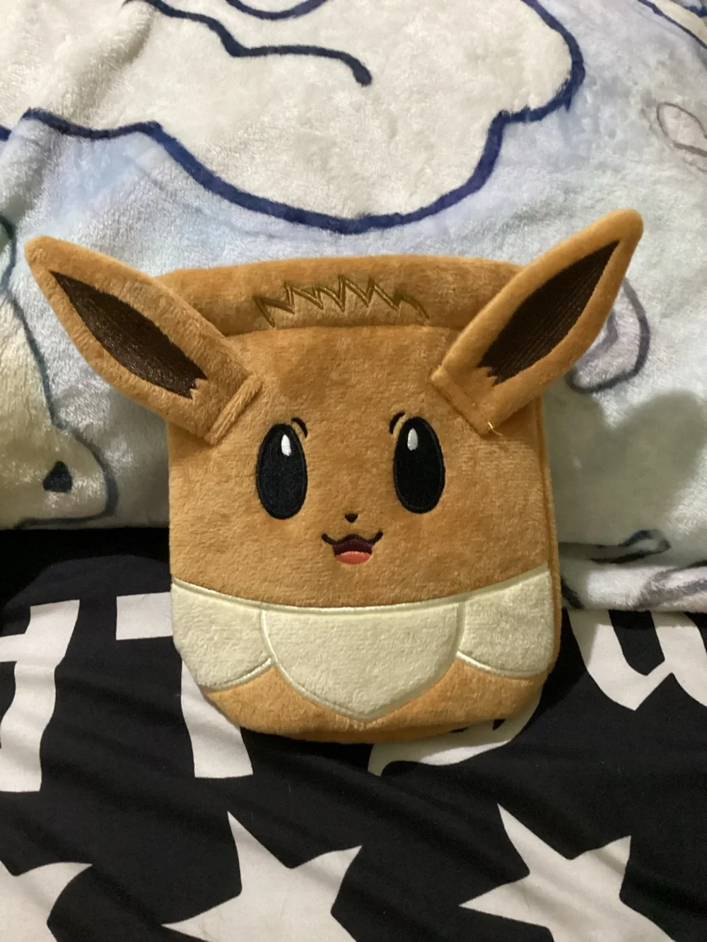 Pokémon Eevee Plush pouch from prismatic evolutions collection box